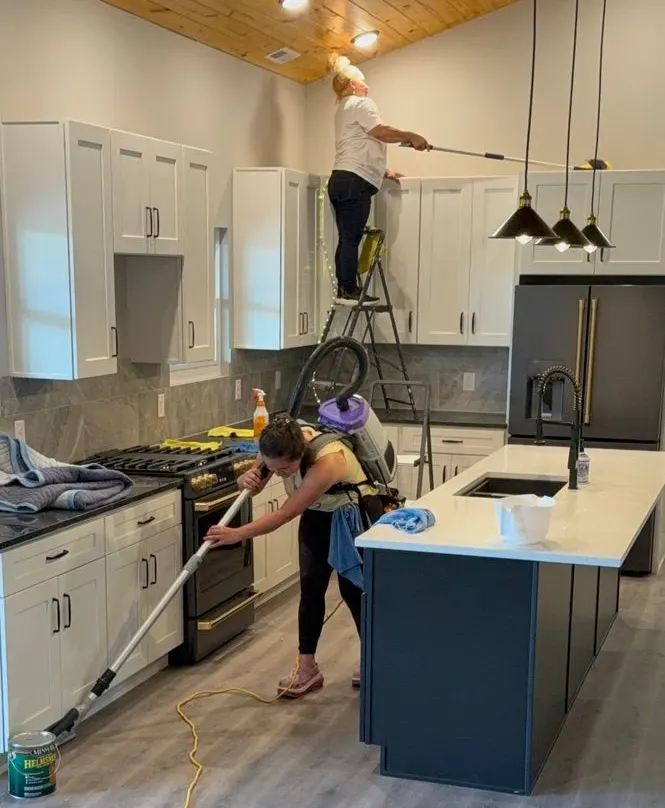 Dynamika People team cleaning a new kitchen